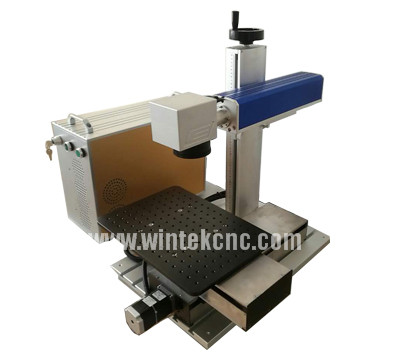 Fiber laser marking machine with table moving